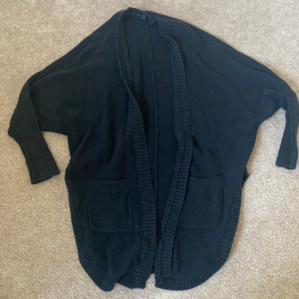 Sweater with deep cuts in sides